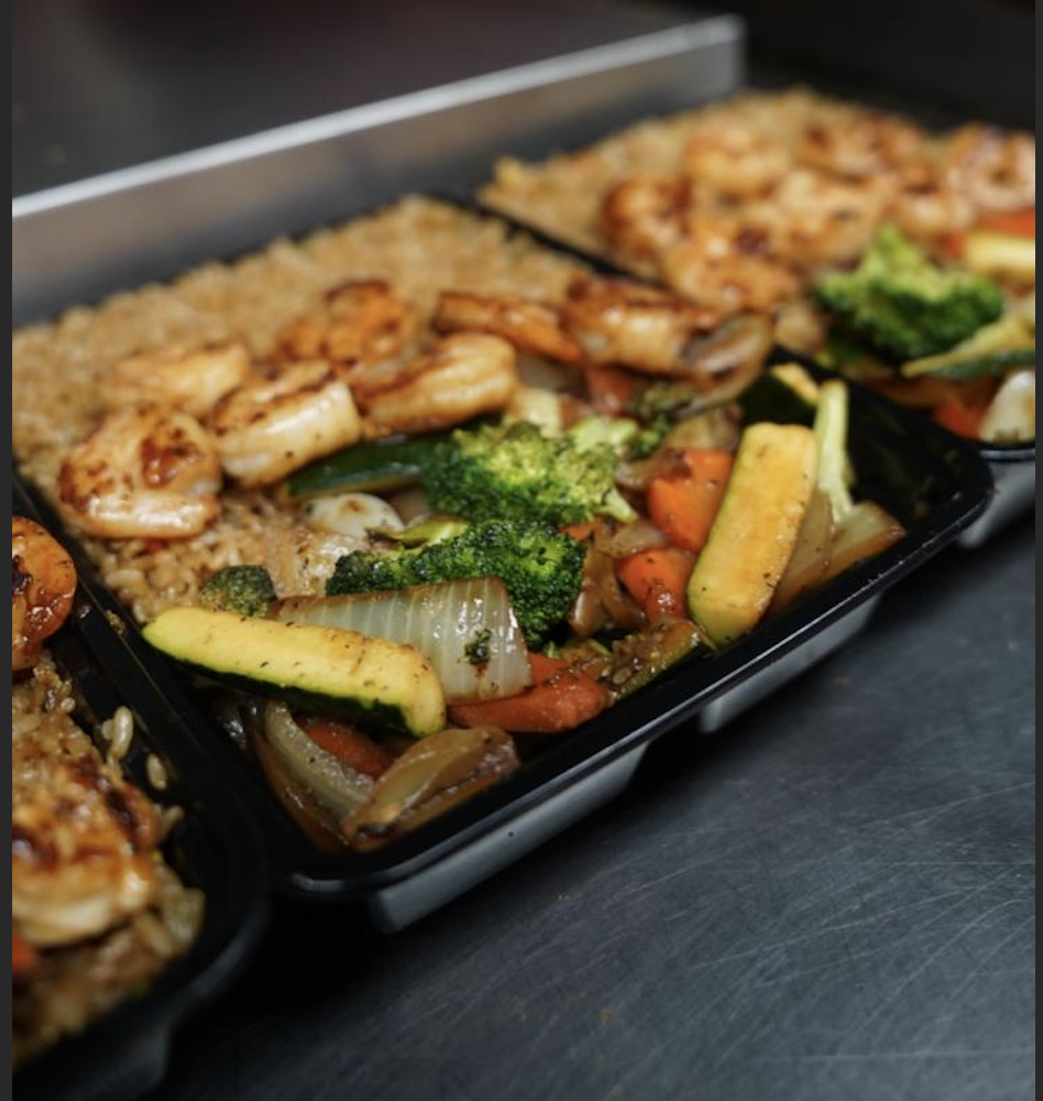 A classic combination of grilled steak and teriyaki chicken.